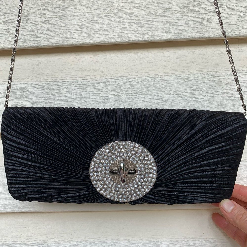 MMS Design Studio black silver buckle clutch, very stylish and elegant.